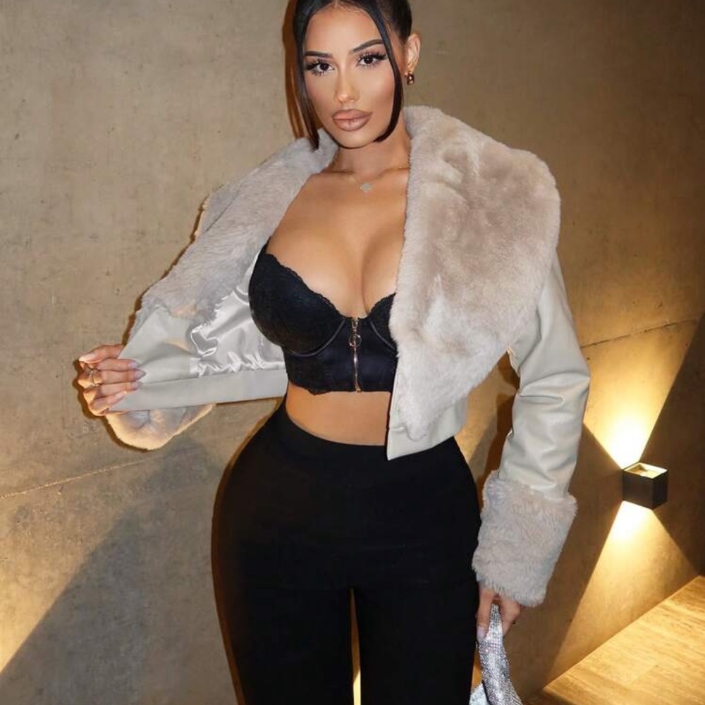Leather coat with fur details